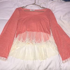 coral blouse with bell sleeves/ lace on bottom!